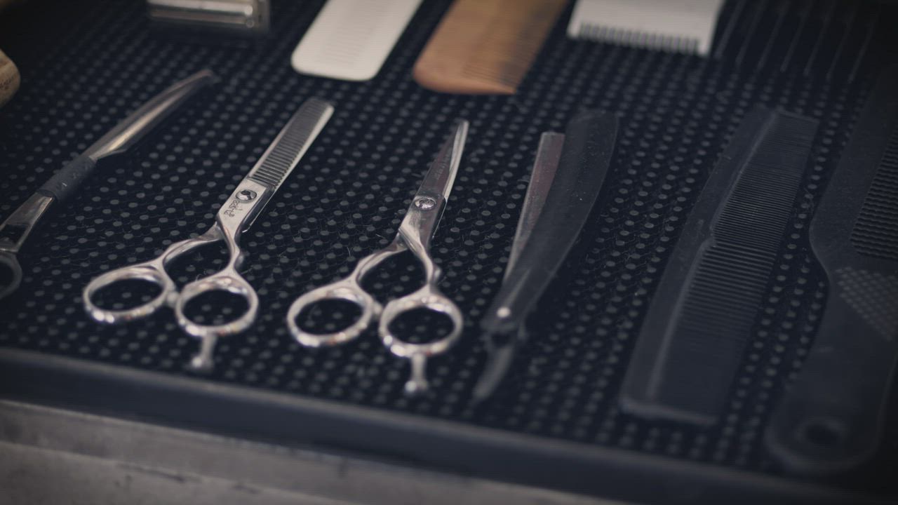 Toalha quente e produtos de barbearia